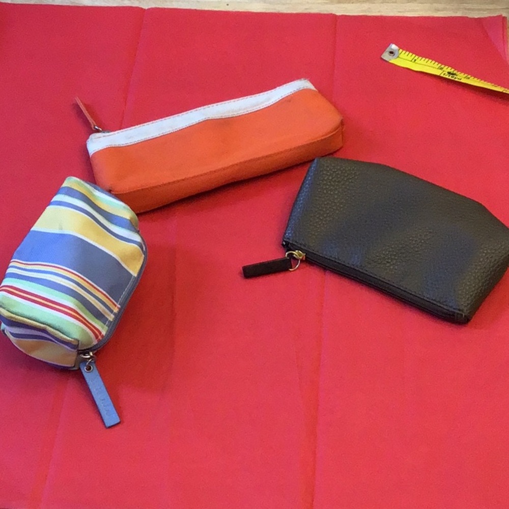 ⭐️10/10.00⭐️ Sale! Estée Lauder small bag set of 3, 2 orange used washable